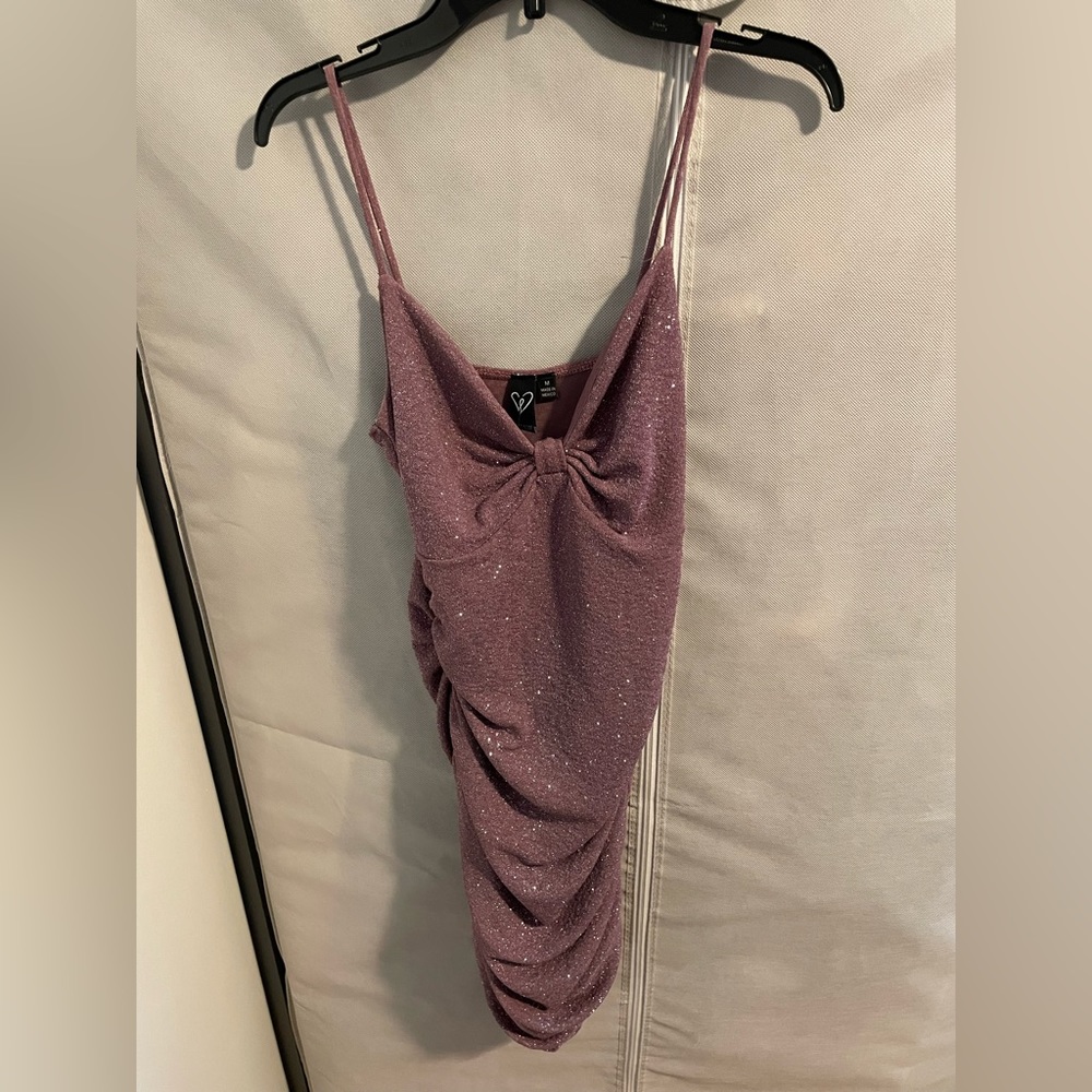 Never worn before purple glitter dress with a bow